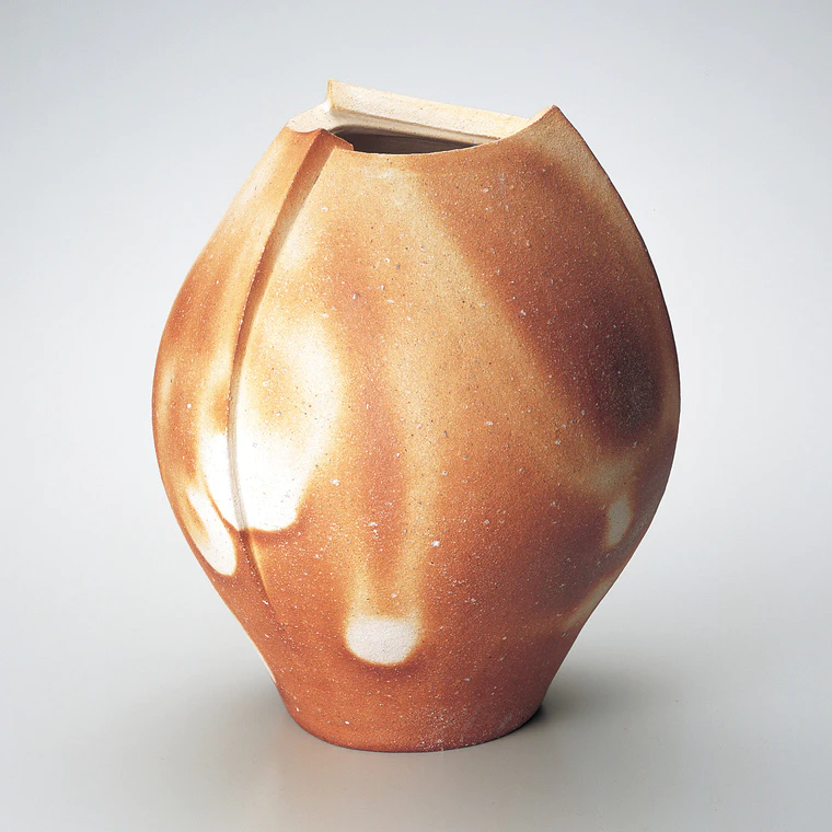 photo Scarlet Faceted Jar Shaped by Beating