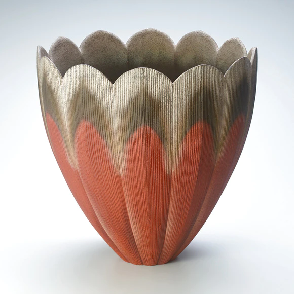 Vessel with engraved lines and colored slip painting