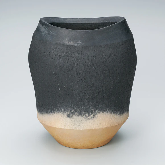 Carbonized Flat Jar with Wind-blown Sand Design
