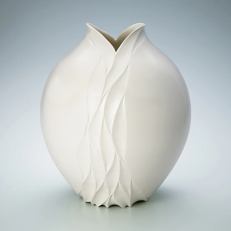 photo Jar with Ivory White Glaze and Carved Decoration