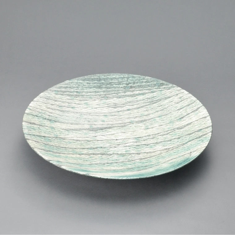 photo Bowl with Nunome Texture, Green Glaze and Wave Design
