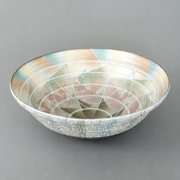 Vessel with Sprayed Slip