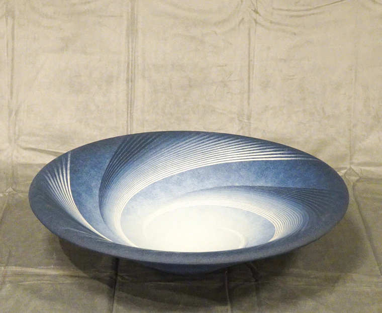 photo Bowl with Raised Line-like Whirl Design in Colored Slip