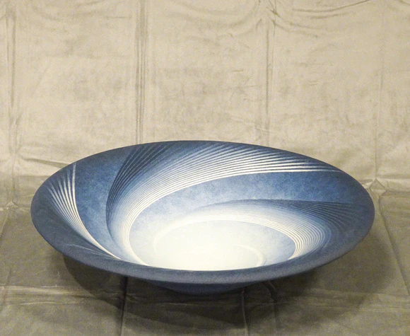 Bowl with Raised Line-like Whirl Design in Colored Slip