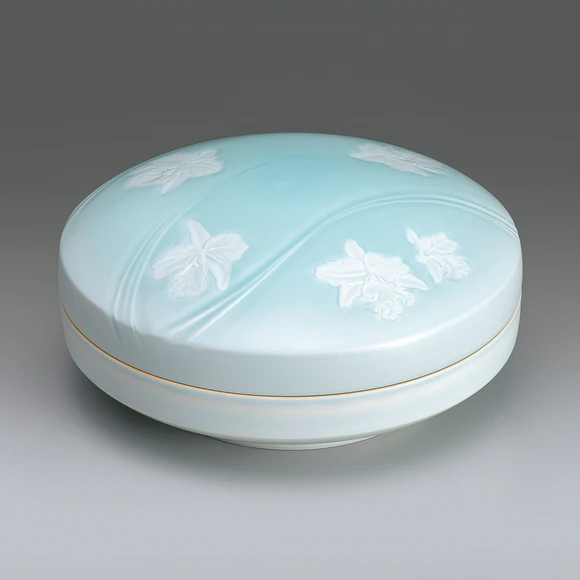 White Porcelain Box with Pale Blue Glaze and Engraved Design