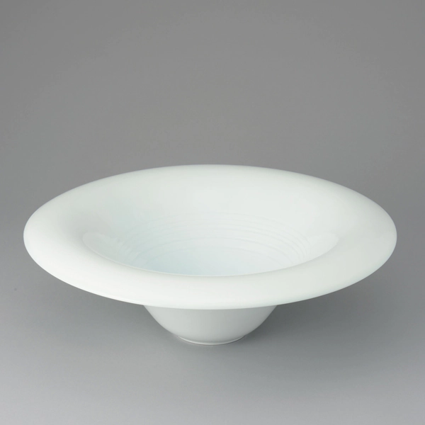 White Porcelain Bowl with Pale Blue Glaze "Wave Pattern"