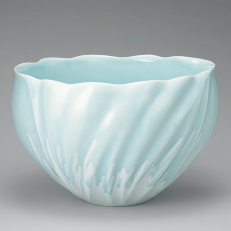 photo White Porcelain Bowl with Pale Blue Glaze