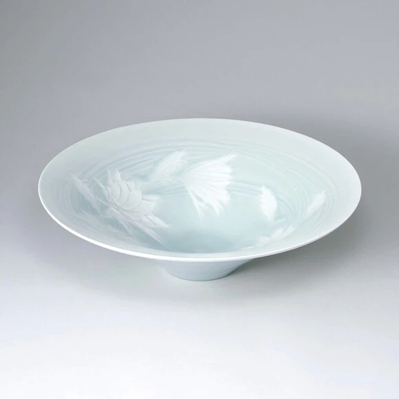 Bowl with Dutchman’s pipe cactus design in sunken relief