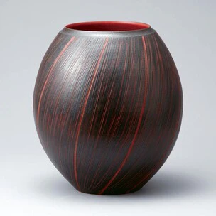 Jar with iron glaze and straw brush painting decoration