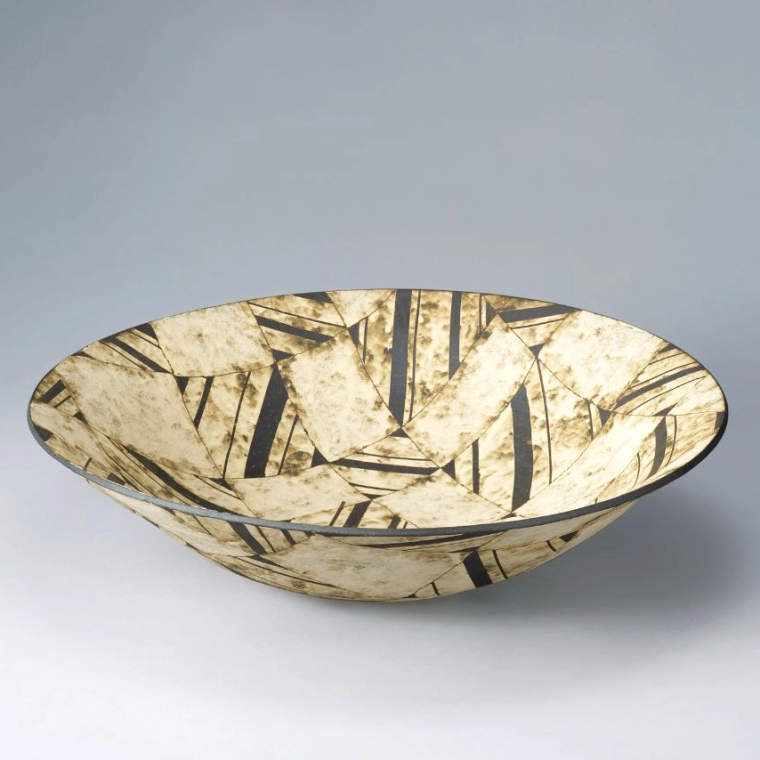 photo Bowl with Cut Paper Design in Colored Slip.