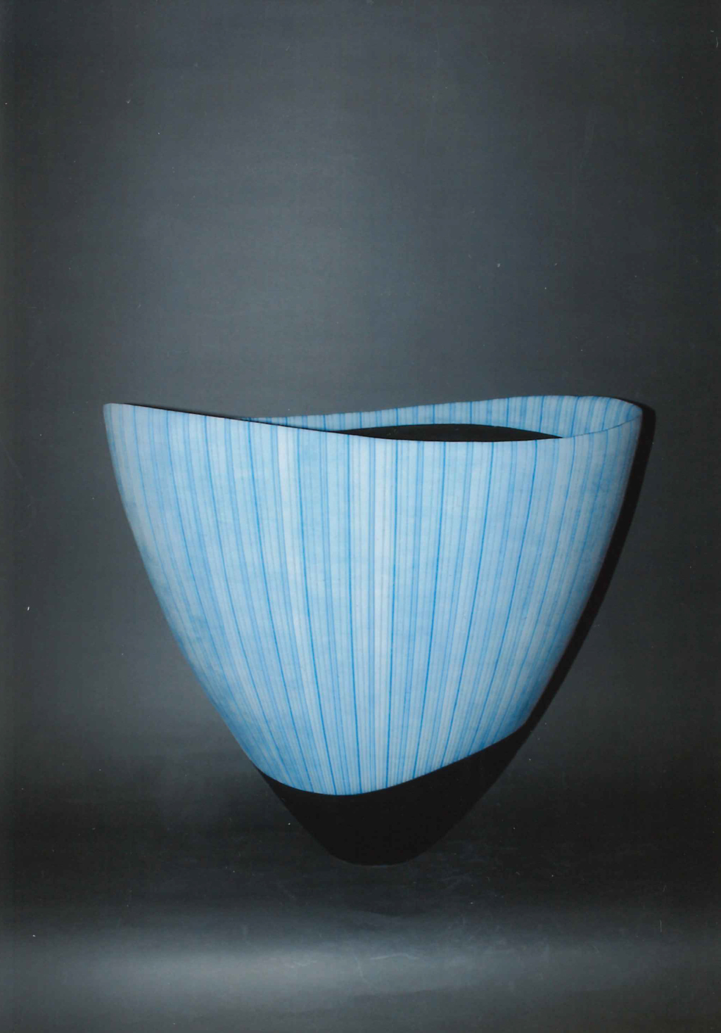photo Vessel with hazy blue glaze and stripe pattern