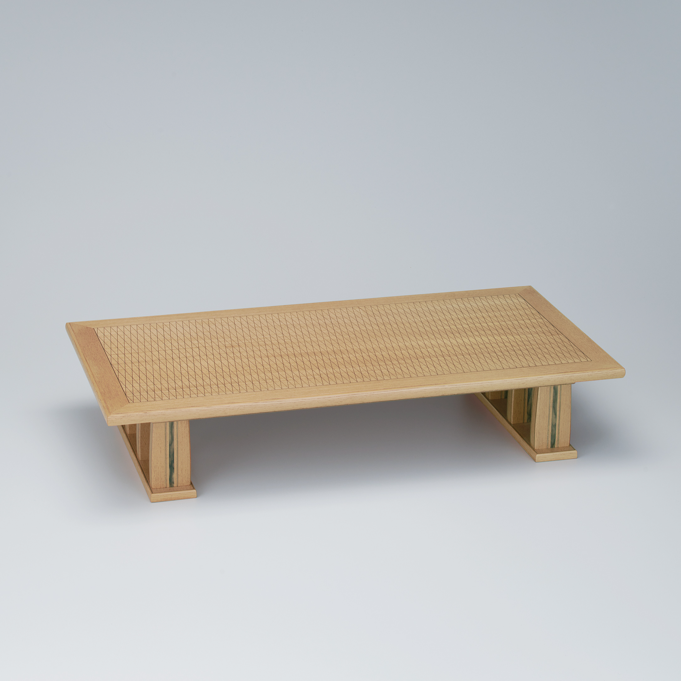 photo Low table of straight grain zelkova wood with inlay decoration.