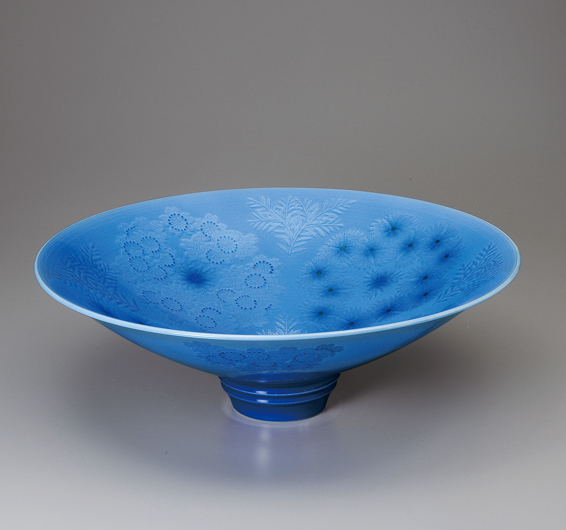 photo Bowl with Light Blue Glaze and Flower Design in Underglaze Silver