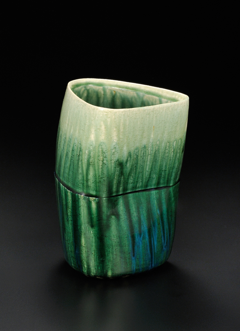 photo Flower vessel with green glaze.